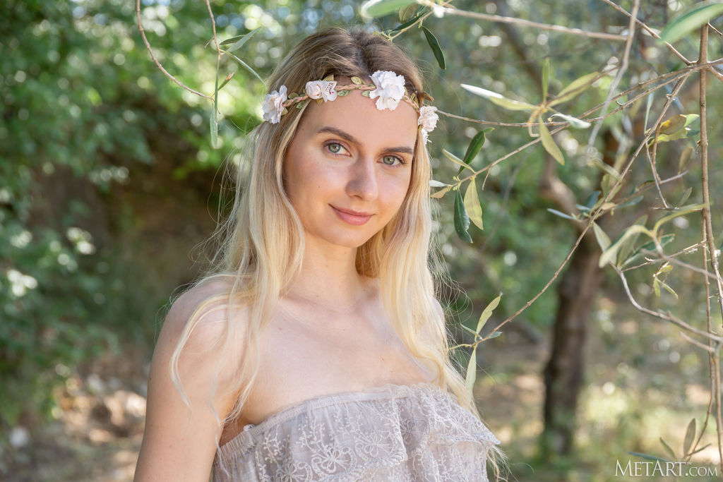 Emily Swan Reclines Under A Shady Tree - Picture 01