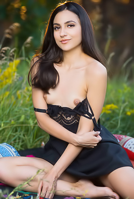 Cira Nerri Slips Down To Expose Her Sexy Small Breasts