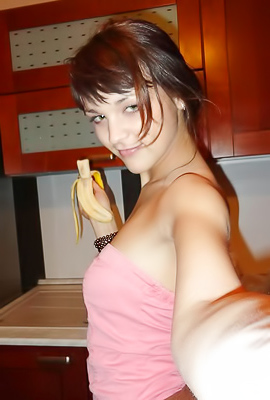 Julie stripping for her boyfriend in the kitchen -